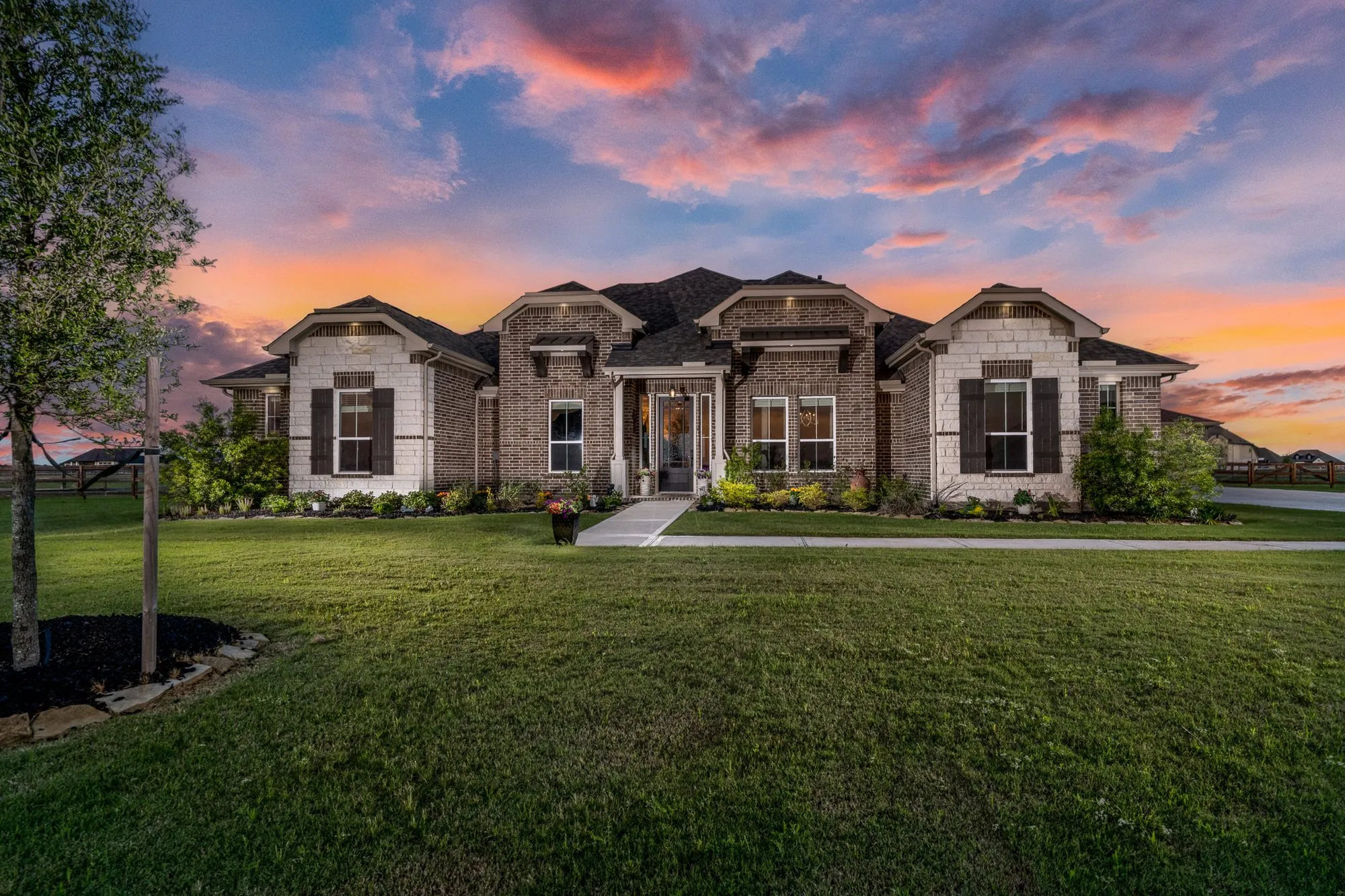 Twilight exterior of a Cypress TX home.